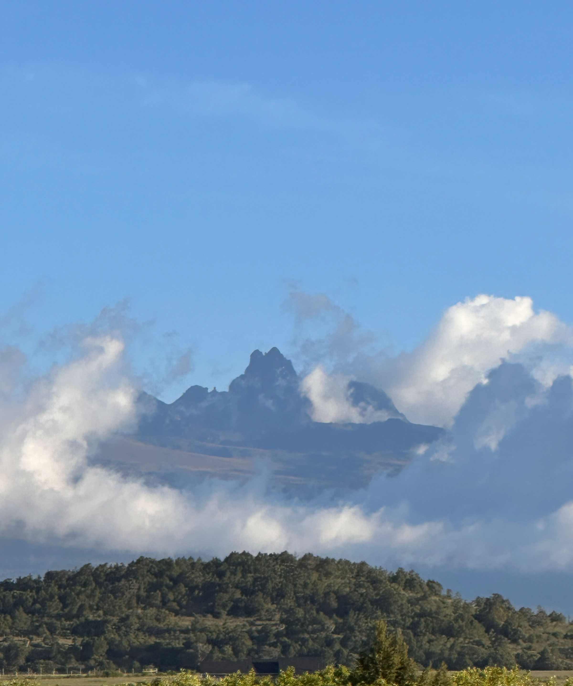This is a picture of mount Kenya in the clouds.